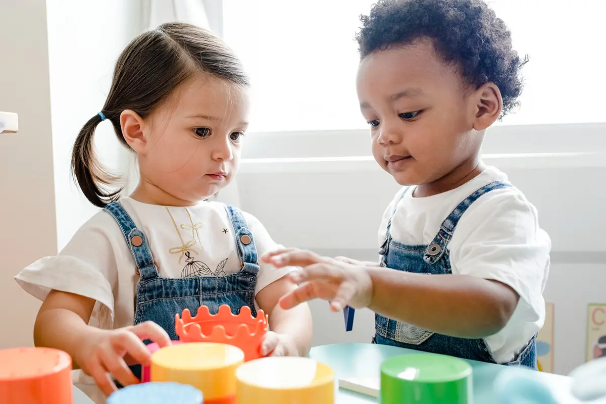 Photo of kids stacking cups